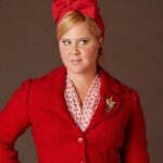 Amy Schumer Instagram - What's your favorite look of @amyschumer It's always the best time collaborating with Amy and her new film #Unfrosted was an absolute blast! I love the process of bouncing ideas off each other and bringing them to life with laughter and creativity. Amy's energy is infectious. Can't wait for you to see the magic we made together. ✨🎬 #Unfrosted #makeup by me #hair by @kimmykuppkakes #costumes by Susan Matheson #llovemyjob #dreamjob #unfrosted #netflix