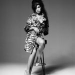 Amy Winehouse Instagram – Amy was photographed by @brookenipar in 2007, showcasing her unique style in a gorgeous zebra coat. 🖤