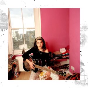 Amy Winehouse Instagram - Amy photographed at her home in Camden town in 2004 by photographer Mark Okoh. 🖤