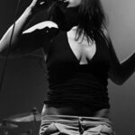 Amy Winehouse Instagram - Amy’s unforgettable performance of “Stronger Than Me” at live at V Festival in 2004 🎤 Her raw talent and soulful voice shines as she takes the stage and captivates us all with her voice and presence. 💓 #Frank20