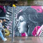 Amy Winehouse Instagram – From Hawley Arms, down to the Stables, Amy is synonymous with Camden. Thanks to @GlobalStreetArt and artists @EllesPaint and @CeeRichards_, a brand new mural has popped up underneath the Camden Town overground bridge on Camden High Street, Chalk Farm Road. Have you seen it yet? 🩷

#BackToBlack