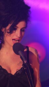 Amy Winehouse Instagram - Amy Winehouse recorded a stunning acoustic performance in a church in the small Irish fishing village of Dingle in 2006. This appearance on Other Voices captures Amy just after the release of her second album, Back to Black, on the cusp of global superstardom. In a YouTube premiere first, we invite fans of Amy Winehouse to join together and watch the performance in full. Tune in to Amy Winehouse’s YouTube channel on Monday 8th April at 18:00 BST to watch full performance on Other Voices, recorded live in Dingle, Ireland, in 2006. Keep an eye here on socials or sign up to the mailing list via the link in bio for a link to watch. 🖤 The performance features the tracks: Tears Dry On Their Own Love Is A Losing Game Back To Black You Know I’m No Good Rehab Me & Mr Jones #backtoblack