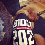 Ana Navarro Instagram - In 2024, we’re taking @hillaryclinton’s wise advice: Don’t vote for anyone you wouldn’t trust with your dog. The choice could not be more clear- you can vote for the nice people who love dogs or you can vote for the man who hates dogs and hangs out with South Dakota’s dog-killing Cruella De Noem. @chacha_cardenas & I are all in for @joebiden & @kamalaharris.