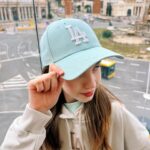 Anastasia Russo Instagram - express trip to Barcelona in my @neweraeurope outfit 🤎✌🏼