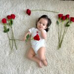 Anjelah Johnson-Reyes Instagram - My sweet angel baby. We can’t believe you’re 9 months old already! You’ve been on 13 flights. You are currently sleep training (again). You recognize your different family members on FaceTime by the things they do and say. You love your doggie brother Banzo. You gnaw on a chicken bone like a grown man and we love it! Happy 9 months #Rosieharlowreyes