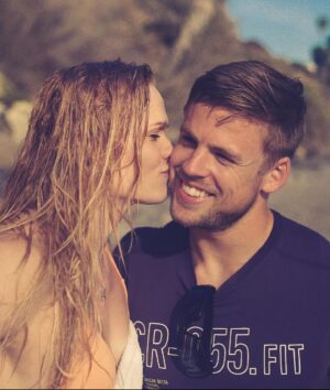 Anníe Mist Þórisdóttir Instagram - My valentine for 13 years now ♥️ CRAZY how time flies and I am grateful for every year. 

Our day today - rest day from training 

-3 hours of working together at the house we are building this morning 
-Physio appointment 
-2 hours of figuring out the set up for the light we want in our garage/gym
-1 hour meeting for Frederik and computer work for me
- I get to pick up our baby and Frederik goes to house to clear out trash and take to recycling for a couple of hours
- Shower and out to sushi social for Dinner date with our girl 🥰
- Work on Empower
- Now snuggle on the couch together 

I wouldn’t want my life any different ♥️

 
#grateful #valentines #mom #life #enjoythejourney #love