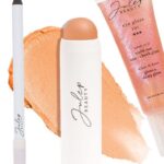 Anna Camp Instagram – Glam Breakdown time: πThis lip tip is my new fave summer trickβ¨For Thursday nightβs premiere of my new flick @fromblackmovie (streaming now exclusively on @shudder and @amcplus !) my makeup artist @brettglam used a trio of @julepbeauty products in a surprising way. Shhhβ¦none are actually made specifically for the lip: First, he lined outside my lip line with Julepβs When Pencil Met Gel Nude Shimmer pencil (meant for eyes, but safe for lips). He said this defines my mouth by adding highlight rather than darkening. He then filled in with the Skip The Blush in Sweet Peach and iced with the glisten-y peachy pink Eye Gloss 101. I was told to keep my lips super shiny -as the shine will give my lip pop, not a deep color. And girl.. you know I love a multi-use hack! #fromblack #glam #mymakeupbag #makeuptricks @rodortegahairstylist @angeltstyle @lesleybohmphoto