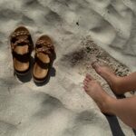 Anna Todd Instagram - sandy toes and salty air 🐚🌴🥥 to keep my birthday month going, im celebrating from paradise. this place is a dream, ive cried a few times (happy tears) and have had the bestttt food and only a tiny sunburn on one part of my back which is a huge win for me lol. i’m also taking tons of inspo for my current WIP 😉 🤫 what is your dream vacation? one you’ve already taken or would love to in the future? how is your week so far? we made it halfway through, im proud of you! tell me all the things 🌴