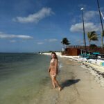 Anna Todd Instagram - sandy toes and salty air 🐚🌴🥥 to keep my birthday month going, im celebrating from paradise. this place is a dream, ive cried a few times (happy tears) and have had the bestttt food and only a tiny sunburn on one part of my back which is a huge win for me lol. i’m also taking tons of inspo for my current WIP 😉 🤫 what is your dream vacation? one you’ve already taken or would love to in the future? how is your week so far? we made it halfway through, im proud of you! tell me all the things 🌴