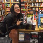 April Jeanette Mendez Instagram - Throwback to fangirl-ing out when I found my first book in the wild! (Fun fact, the stranger I asked to take this pic did not believe it was actually mine because PHOTOSHOP IS REAL.)