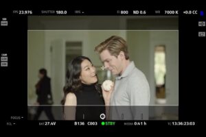 Arden Cho Instagram - Swipe to see the true behind the scenes of this photo @domsherwood can’t believe they actually caught us both smiling at the same time hehehe #silly #setlife #PartnerTrack #Murphy #Ingrid