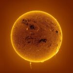 Arianna Huffington Instagram – The big solar news next week is about not being able to see the sun. But as the work of award-winning solar astrophotographer @eduardoschaberger shows, our sun is full of mysteries and wonder even when not being photobombed by the pushy moon. 

This shot of a recent solar flare shows a plasma column shooting out over 124,000 miles from the sun’s surface (over half the distance from Earth to the moon). It’s a sign the sun will soon enter the most active phase of its 11-year solar cycle known as the solar maximum, which sounds like a good action movie title. 

“To be able to see or photograph a little bit of the intimate life of a star is truly very exciting,” says Schaberger. If you’re going to be watching what poet Robert Herrick called the “glorious light of heaven” dim for a few moments, just remember to wear eclipse glasses or make your own pinhole camera. 

📸: @eduardoschaberger