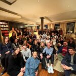 Arianna Huffington Instagram – Had an amazing go-to-market kickoff at our offsite at @Thrive Global in NYC. We ended each night with something special to bring the team together: first, the team gathered for dinner at my home, where we were treated to a captivating musical performance by world-renowned pianist and composer @ChadLawson, and day two concluded with team bowling and dinner! Throughout our time together, we focused on some important themes:

Reflecting on new beginnings: Embracing the fresh start each month offers, we entered the new fiscal year with gratitude for our incredible team and our shared commitment to Thrive’s mission.

Emphasizing open communication: We highlighted our core cultural value of using compassionate directness to resolve issues and nurture healthy relationships. The team knows that my door (and phone line) is always open.

Expanding opportunities: Success isn’t just about reaching goals, it’s about building on our momentum. With exciting partnerships on the horizon, we’re poised to scale our impact even more in the coming year.

Gratitude for our team: Each Thriver brings passion and dedication to our mission every day.

I’m excited for another year of growth, collaboration, and thriving together!
.
.
.
#ThriveGlobal #Teamwork #GTM #GotoMarket #Technology #Health #Wellbeing #Team #Offsite