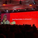 Arianna Huffington Instagram - Loved being back at the @gptw_us For All Summit, this time in New Orleans, where I shared the stage with @Synchrony CHRO DJ Casto and @DesignObserver editor-in-chief Ellen McGirt. And I got to wear my favorite cape – which is now in rotation as an official repeat – to cover my arm sling (while my broken shoulder heals). The topic was “Why Investing in Well-being Is a Productivity Multiplier.” And what DJ is doing at Synchrony is a great example, including bringing @Thrive Global to support both their frontline associates and their corporate associates. My favorite stat is that 78% of their contact center agents would rather have a 60-second Reset fed to them in moments of stress than be given a five minute break! And of course, to create thriving workplaces that use well-being to drive productivity, it has to start at the top. As DJ said, “We don’t believe you can lead well if you aren’t well.” #ForAllSummit2024 . . . #GreatPlaceToWork #GPTWCertified #ThriveGlobal #Health #Wellbeing #NewOrleans #HiltonRiverside