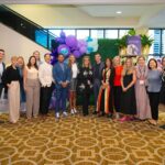 Arianna Huffington Instagram - Loved being back at the @gptw_us For All Summit, this time in New Orleans, where I shared the stage with @Synchrony CHRO DJ Casto and @DesignObserver editor-in-chief Ellen McGirt. And I got to wear my favorite cape – which is now in rotation as an official repeat – to cover my arm sling (while my broken shoulder heals). The topic was “Why Investing in Well-being Is a Productivity Multiplier.” And what DJ is doing at Synchrony is a great example, including bringing @Thrive Global to support both their frontline associates and their corporate associates. My favorite stat is that 78% of their contact center agents would rather have a 60-second Reset fed to them in moments of stress than be given a five minute break! And of course, to create thriving workplaces that use well-being to drive productivity, it has to start at the top. As DJ said, “We don’t believe you can lead well if you aren’t well.” #ForAllSummit2024 . . . #GreatPlaceToWork #GPTWCertified #ThriveGlobal #Health #Wellbeing #NewOrleans #HiltonRiverside