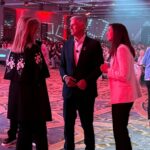 Arianna Huffington Instagram - Loved being back at the @gptw_us For All Summit, this time in New Orleans, where I shared the stage with @Synchrony CHRO DJ Casto and @DesignObserver editor-in-chief Ellen McGirt. And I got to wear my favorite cape – which is now in rotation as an official repeat – to cover my arm sling (while my broken shoulder heals). The topic was “Why Investing in Well-being Is a Productivity Multiplier.” And what DJ is doing at Synchrony is a great example, including bringing @Thrive Global to support both their frontline associates and their corporate associates. My favorite stat is that 78% of their contact center agents would rather have a 60-second Reset fed to them in moments of stress than be given a five minute break! And of course, to create thriving workplaces that use well-being to drive productivity, it has to start at the top. As DJ said, “We don’t believe you can lead well if you aren’t well.” #ForAllSummit2024 . . . #GreatPlaceToWork #GPTWCertified #ThriveGlobal #Health #Wellbeing #NewOrleans #HiltonRiverside