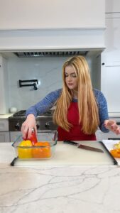 Ariel Winter Instagram - One of our go-to weeknight dinners. These stuffed peppers are so simple and sooo good🤤 Save this for dinner inspo! Inspired by Dinner At The Zoo’s recipe🫑 6 bell peppers 1 lb ground turkey breast Olive oil 2 onions— diced 6 cloves garlic— minced or finely chopped Tops of bell peppers (not stem)— chopped 1 cup *cooked* white rice Salt Pepper Italian Seasoning Oregano Fresh mozzarella log— shredded Fresh parsley- chopped Cooking spray Prep some rice in a rice cooker. Turn oven to 350 and wash bell peppers. Once dried, cut the tops off, remove ribs & seeds, and place cut side down in a baking dish pre sprayed with cooking spray. Add an inch of water into the dish, cover with foil and place in the oven for 20-25 minutes. Take peppers out and put on paper towel cut side down to dry. You do not want water in your peppers when you put filling! Wipe baking dish if there is left over water and add more cooking spray. Dice onion and tops of bell peppers, then mince or finely chop garlic. Shred mozzarella and set aside. Heat oil in a pan & add the onion and bell peppers. Cook for 3-4 minutes until softened. Add garlic & cook for 30 seconds-1 minute. Do not let garlic burn. Add ground turkey and salt & pepper. Break up meat with a spatula & wait for it to cook through. Add Italian seasoning & oregano. (I add a little dried parsley in there as well as the fresh parsley that will later go on top of the mozzarella.) Next add the cooked rice and tomato sauce and stir. Make sure to taste as you go! I prefer to over season rather than under, but the key to getting the best result is to taste and add as you go. Add half of the mozzarella & stir again until fully melted and combined. Put peppers back in baking dish & fill. Add the rest of the mozzarella on top. Cover with foil (covered with cooking spray as well so the cheese doesn’t stick). Bake for 20 minutes, then remove foil and add fresh parsley on top and then bake for another 10 until cheese is lightly browned. Remove from oven and enjoy!!! #dinnerideas #stuffedpeppers #dinnerrecipe