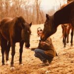Arielle Kebbel Instagram - every where I go i talk about wild horses, the sickening politics behind round ups and the incredible work @skydogsanctuary does to help rescue wild horses and burros who’ve ended up in kill pens, are headed to slaughter, been abused, starved, or neglected. they also educate people about what’s happening to America’s wild horses and the implications of the Bureau of Land Management’s Adoption Incentive program. thank you @bedfordnewcanaanmag for your support and thank you @juliebettstestwuide for the most special photographs of me and snow. you capture precious moments and i cherish them. photographed at the beautiful Rounded Crest Farm where both @manhattanridingclub @galloping_guru are located ( fun fact, a quiet place was also filmed here ;) * #savewildhorses #wildhorserescue #mustang #wild #bedford #newcaanan #magazine #wildhorsephotography #stoptheroundups #snowwhite