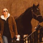 Arielle Kebbel Instagram - every where I go i talk about wild horses, the sickening politics behind round ups and the incredible work @skydogsanctuary does to help rescue wild horses and burros who’ve ended up in kill pens, are headed to slaughter, been abused, starved, or neglected. they also educate people about what’s happening to America’s wild horses and the implications of the Bureau of Land Management’s Adoption Incentive program. thank you @bedfordnewcanaanmag for your support and thank you @juliebettstestwuide for the most special photographs of me and snow. you capture precious moments and i cherish them. photographed at the beautiful Rounded Crest Farm where both @manhattanridingclub @galloping_guru are located ( fun fact, a quiet place was also filmed here ;) * #savewildhorses #wildhorserescue #mustang #wild #bedford #newcaanan #magazine #wildhorsephotography #stoptheroundups #snowwhite