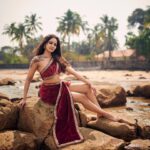 Ashi Singh Instagram – Red hot and ready to take on the ocean (or maybe just this rock for now). This dress is making waves 🌊(pun intended)! 

Photographer – @mirajverma_photography
 Makeup & Hair – @makeoverbysejalthakkar
Outfit by – @jiya_fashion_designer
Jewellery- @nihiraa_india X @purvabansal5
Team – @greenlight__media
.
.
.
#ashisingh #mermaidvibes #beachlife #reddress #fashiononthebeach #feelingbeautiful #oceanlove #dreamyescape #bollywood #fashion