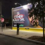 Ashleigh Murray Instagram - We were just strolling along at 10p and found a massive, massive wall with my face on it 😭 @theotherblackgirlhulu is still available to stream right now!