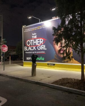 Ashleigh Murray Instagram - We were just strolling along at 10p and found a massive, massive wall with my face on it 😭 

@theotherblackgirlhulu is still available to stream right now!