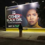 Ashleigh Murray Instagram - We were just strolling along at 10p and found a massive, massive wall with my face on it 😭 @theotherblackgirlhulu is still available to stream right now!
