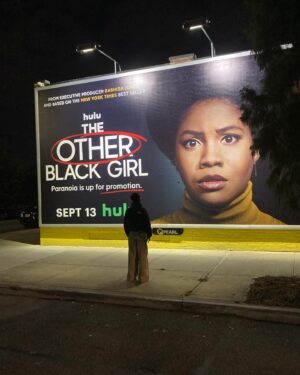Ashleigh Murray Instagram - We were just strolling along at 10p and found a massive, massive wall with my face on it 😭 

@theotherblackgirlhulu is still available to stream right now!