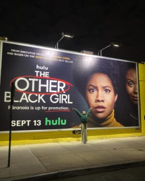 Ashleigh Murray Instagram - We were just strolling along at 10p and found a massive, massive wall with my face on it 😭 

@theotherblackgirlhulu is still available to stream right now!