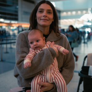 Ashley Greene Instagram - Baby girl handled her first international flight like a champ! #travelwithbaby