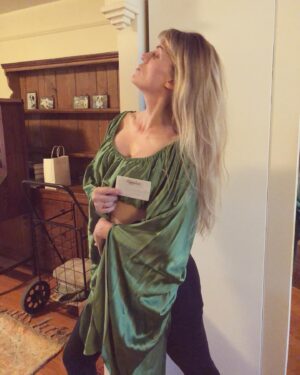 Ashley Johnson Instagram - It’s my sister’s birthday (@therantinghousewife). She’s the greatest. Here are 10 pictures that will absolutely mortify her. 

1. When I was packing up my New York apartment to come back home to Los Angeles, my Mom, sister and niece, surprised me with a visit to help me pack up. My sister did not help me, instead, she decided to try on clothes and do a photoshoot with my Mom. 
2. Such grace. Such beauty. Pure elegance. #edgy #décolleté 
3. Listen, I have a great head of hair, but my sister was blessed with a head of Unicorn hair that is truly a sight to behold. 
4. Time’s Square.  She also has legs for days. She may have got the hair and the legs. But I got the...Long torso and bigger feet. Which definitely makes me coordinated. 
5.  Yes, she’s pregnant in an Avatar costume with weird socks/tights on her feet (which are a size FIVE BY THE WAY) and no I will not explain further. 
6. The House of Eternal Return aka @meow__wolf 
7.  That one time we were sitting in the last row of the plane and when it was time to de-board, I slipped into the bathroom real quick (I really had to pee) and when I came out, the plane was empty and as I was walking off the plane, my sister was sitting in the pilot’s seat with the pilot’s hat on, and honestly that kind of thing is completely normal with my sister. 
8. Flying Beauty. 
9. We try to take a sister’s trip every year. This was one of my favorites. #bandoliernationalmonument 
10. Little known fact, my sister and her husband (my brother in law not to brag) have the same birthday. 

I love you, B. You’re incredible and I feel so lucky I get to be your sister.