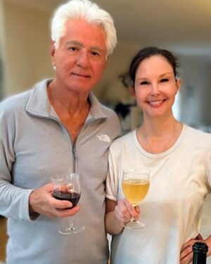 Ashley Judd Instagram - I love spring birthdays and I love my Pop. He came into my life when I was 11 and the day we met I was practicing my cheerleader moves - and he let me climb up to stand on his shoulders before we fully knew each others’ names. He’s held me high since then, and with  Mom gone, we are closer than ever. Happy Birthday, Pop.