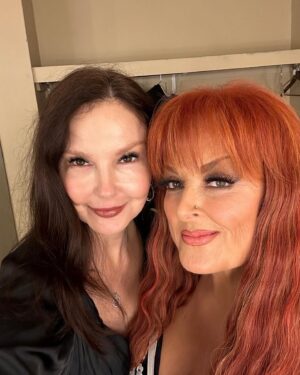 Ashley Judd Instagram - My big sister. My protector who powdered me when I was an infant, let me do her Civics homework when I was in 6th grade (which made me feel "big”), who taught me how to drive (it was a 1957 Chevy), with whom I compared mosquito bites  after we played in eastern Kentucky creeks looking for crawdads. Oh, yes — she happened to sing some, too. 

This past Friday, she sang in Knoxville, and it was glorious. My favorite songs are the ones our Mama wrote, so customized for her voice are they. Thank you to fans for loving my sister @wynonnajudd and helping to give her life purpose and meaning, and for recognizing that she’s indeed the G.O.A.T.