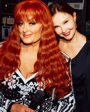 Ashley Judd Instagram - My big sister. My protector who powdered me when I was an infant, let me do her Civics homework when I was in 6th grade (which made me feel "big”), who taught me how to drive (it was a 1957 Chevy), with whom I compared mosquito bites  after we played in eastern Kentucky creeks looking for crawdads. Oh, yes — she happened to sing some, too. 

This past Friday, she sang in Knoxville, and it was glorious. My favorite songs are the ones our Mama wrote, so customized for her voice are they. Thank you to fans for loving my sister @wynonnajudd and helping to give her life purpose and meaning, and for recognizing that she’s indeed the G.O.A.T.