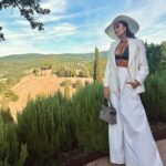 Ashley Park Instagram - 🕊️my first time in the italian countryside! the essence of this region and of the entire Cucinelli family takes my breath away. genuinely grateful to celebrate @brunellocucinelli birthday and legacy 🤍
