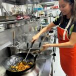Ashley Park Instagram - cooking class in Thailand was wow, so who wants to try my ‘park thai’?? (Swipe for 👩🏻‍🍳) happy holidays kaaaa