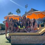 Ashley Park Instagram - when your only sibling is marrying the man of her dreams and wants a bachelorette party in Barcelona, YOU DO A BARCELONA BACHELORETTE… aperol spritz-themed, homemade paella-filled, with all her awesome friends 🍹🥘👰🏻🌞🥂 @audreyhehepark @kimptonvividora