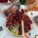 Ashley Park Instagram - when your only sibling is marrying the man of her dreams and wants a bachelorette party in Barcelona, YOU DO A BARCELONA BACHELORETTE… aperol spritz-themed, homemade paella-filled, with all her awesome friends 🍹🥘👰🏻🌞🥂 @audreyhehepark @kimptonvividora