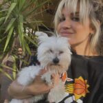 Ashley Roberts Instagram – We had to say good bye to our little Cooper this week. He almost made it to his 16th birthday. He traveled all over with me. Loved getting in his bag knowing an adventure awaited. Let me dress him up in ridiculous outfits. Even had his own episode on a tv show I filmed years back. What a legend. After he got attacked at a park he spent the last few years in AZ with my mom. Where she nurtured him and took such good care of the lil guy. So much joy he brought to so many. Rest in peace lil Coop. Love you buddy. Best buddy in the world 🐾