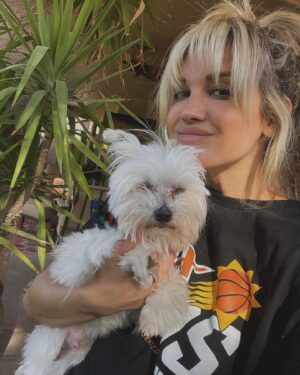 Ashley Roberts Instagram - We had to say good bye to our little Cooper this week. He almost made it to his 16th birthday. He traveled all over with me. Loved getting in his bag knowing an adventure awaited. Let me dress him up in ridiculous outfits. Even had his own episode on a tv show I filmed years back. What a legend. After he got attacked at a park he spent the last few years in AZ with my mom. Where she nurtured him and took such good care of the lil guy. So much joy he brought to so many. Rest in peace lil Coop. Love you buddy. Best buddy in the world 🐾