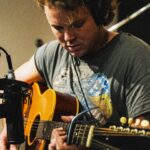 Ashton Irwin Instagram - emotional intelligence, a $500 Guns N’ Roses T shirt & some really nice chords