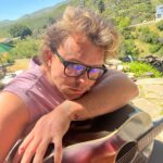 Ashton Irwin Instagram - Prepare yourself, the following is a documentation of my current existence - the first two are just me chillin during my morning guitar ritual, wake up and play - bought a BBQ - here’s where it gets strange, I’m practicing my fire twirling skills and in my head I seem to think that’s what they do at Pomona beach/ Huntington Beach New Year’s Eve 😂 big things coming from this - “throwing ass” to prince on an FM radio in my house that I use for some reason now? It just feels good to listen too - hungover at pampas Brazilian food at the grove - getting massive beers with my bud @mrjmachanson - doing 100 sumo squats a day for the foreseeable future - with my green Gretsch shooting a video in the forest in Malibu at night time, creepy but cool Living La Vida Loca Ciao! X’s 💋