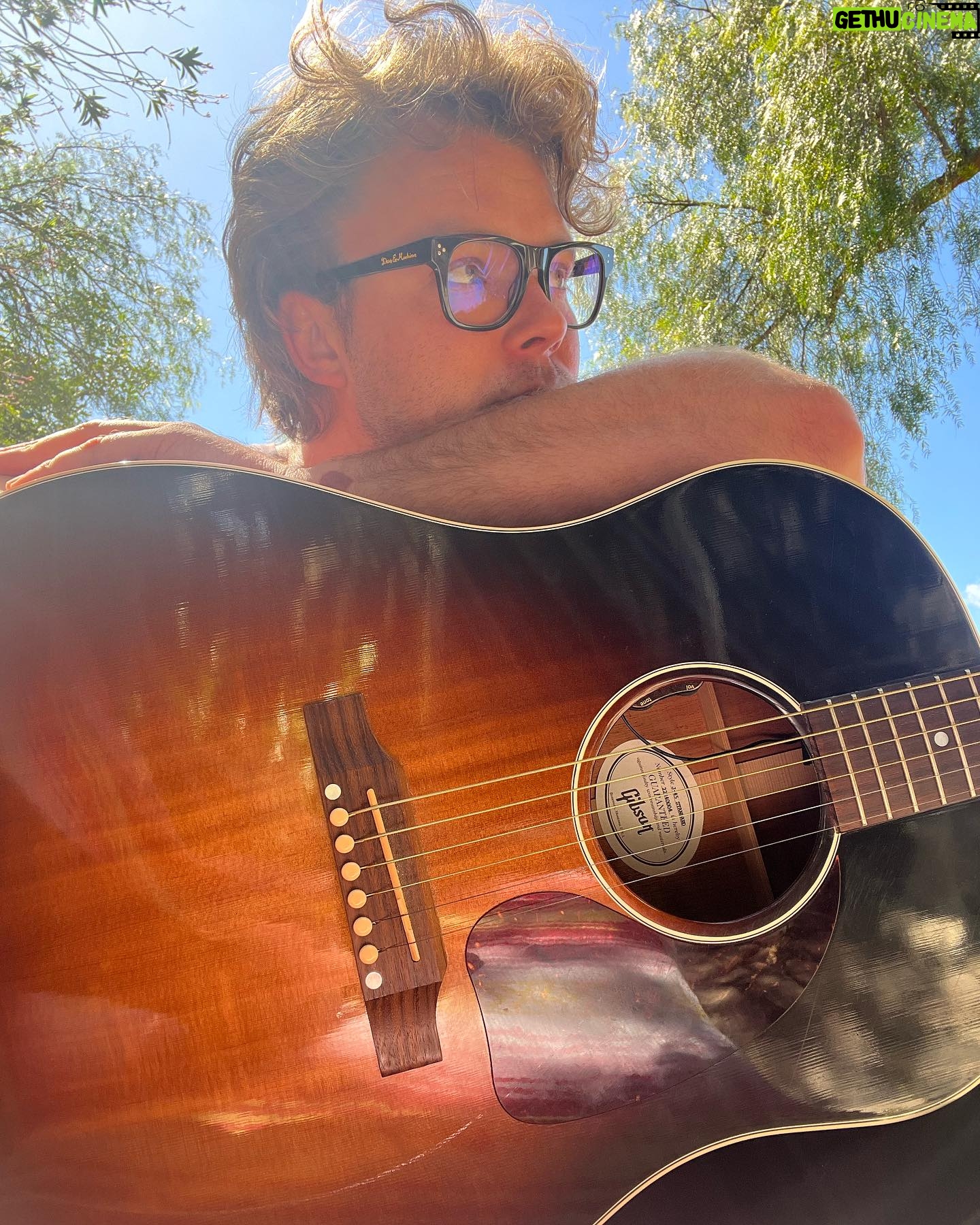 Ashton Irwin Instagram - Prepare yourself, the following is a documentation of my current existence - the first two are just me chillin during my morning guitar ritual, wake up and play - bought a BBQ - here’s where it gets strange, I’m practicing my fire twirling skills and in my head I seem to think that’s what they do at Pomona beach/ Huntington Beach New Year’s Eve 😂 big things coming from this - “throwing ass” to prince on an FM radio in my house that I use for some reason now? It just feels good to listen too - hungover at pampas Brazilian food at the grove - getting massive beers with my bud @mrjmachanson - doing 100 sumo squats a day for the foreseeable future - with my green Gretsch shooting a video in the forest in Malibu at night time, creepy but cool Living La Vida Loca Ciao! X’s 💋