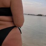 Aurélie Van Daelen Instagram - This is your sign not to hide this summer 🏝️ Ceci est ton signe de ne plus te cacher cet été, sur la plage, autour de la piscine… Ceci est mon corps, il n’est pas parfait mais c’est le mien, je l’aime et l’aimerai à chaque moment de ma vie 🩷 maillot @etam