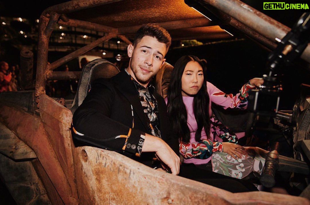 Awkwafina Instagram - How we showed up to the @jumanjimovie premiere! Was a lovely ride with this awesome dude @nickjonas . #jumanji here we go!! TCL Chinese Theatres