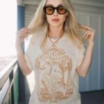 Becca Tobin Instagram - It’s here! 🇺🇸 Comment MERCH in the comments to get a DM with shopping link and a 15% OFF discount code. ✌🏼💕 #merch #ladygang #new #merchdrop #florida #girlstrip #shop #newintheshop #ladygangshop #getitnow