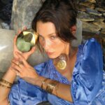 Bella Hadid Instagram - A magnet for the life you want to attract 🌀 WINDOW2SOUL🌹 TOP: jasmine // MIDDLE: rose // BASE: tonka bean  SALTED MUSE 🌊 TOP: sea salt // MIDDLE: olive tree // BASE: cedarwood BLOOMING FIRE 🔥 TOP: bergamot // MIDDLE: monoi // BASE: patchouli   🌀 SHAKE TO ACTIVATE
