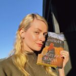 Beth Behrs Instagram – Inspired by my girl @emilyhenrywrites and her #book #selfies. I am madly in love with this one @ahoffmanwriter ! I love all of your books and read them always at the beginning of Fall! 🍂🍁🍂🌾

#bookstagram #books #booklover #booknerd #bookaddict #bookworm #fall #falldecor #practicalmagic #witch #witchesofinstagram #booktok #read