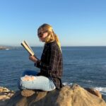 Beth Behrs Instagram - Sometimes where you read can be just as magical as what you're reading. Grab a buddy, grab your book and get out there! Where are you reading today? #bookstagram #books #book #booklover #booknerd #bookaddict #bookreview #bookrecommendations #thenightengale #literature #literary #booktok #bookporn #booknook #travel #ocean #kimkardashian #kyliejenner #taylorswift #read #readmorebooks #falldecor #practicalmagic #fall #fallvibes