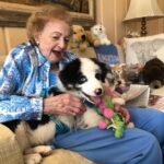 Betty White Instagram - Although Betty’s beloved Golden Retriever, Pontiac, passed away in 2017, we made sure she always had opportunities to get her hands on fur babies. In this picture from early 2020 she’s meeting my new-at-the-time pup, Molly.